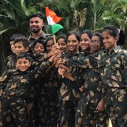 A proud moment with my students for an Independence Day performance. We created a patriotic dance piece with army-themed costumes that was a huge hit with the audience.
