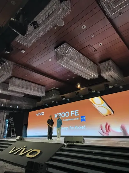 Our team on stage during a technical check for the Vivo launch, ensuring the visuals and branding are perfect.