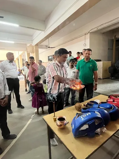 A traditional pooja ceremony for our new boxing equipment. We teach our students, including the children, to respect the sport and the tools of their craft.