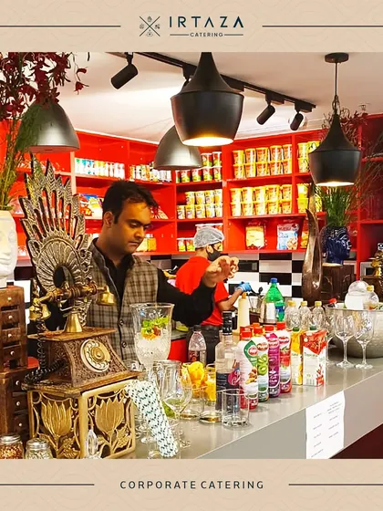 A vibrant bar setup at a corporate event. My team is ready to serve drinks, showcasing that my services can extend beyond food to complete beverage solutions for your party.
