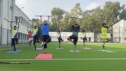 Our training goes beyond the usual drills. I incorporate yoga sessions, using hockey sticks for balance exercises, to improve flexibility, focus, and core strength in my athletes.