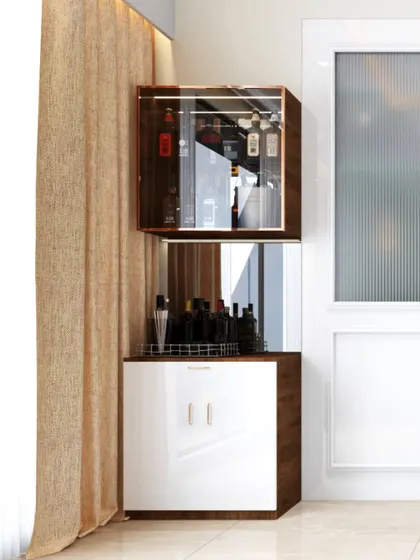 This compact, corner bar unit is a perfect space-saving solution. It features a glass-front upper cabinet and a lower cabinet with a mirrored back to create an illusion of depth.