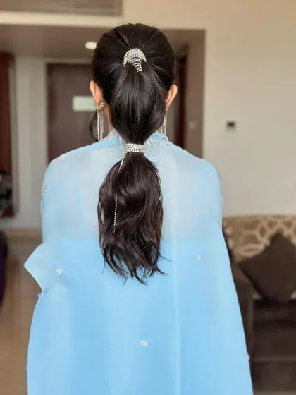 The full back view of the rhinestone bubble ponytail, showing the clean lines and the eye-catching sparkle of the accessories.
