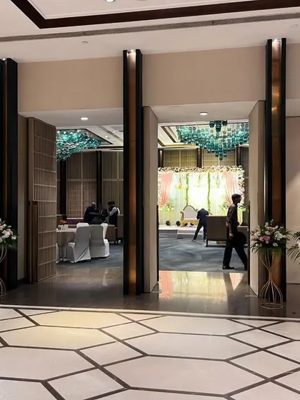 Another perspective of the entrance, showing how we use decor to frame the view into the event space, building anticipation for the guests.