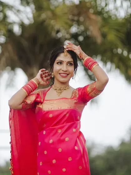 A duplicate of the previous image, an outdoor portrait of the bride.