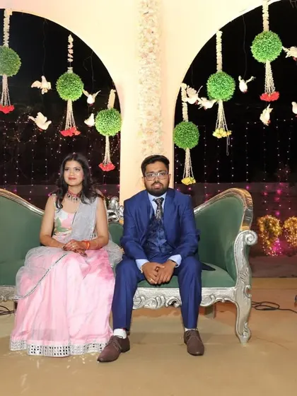 Posing on the stage seating after our performance. I help couples feel confident not just while dancing, but in every moment they are in the spotlight.
