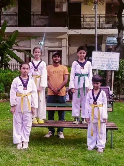 My students after their color belt examination. Each one of them earned their new rank through hard work.