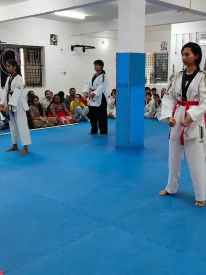 Students stand ready for the next command.