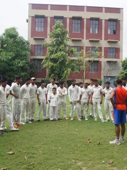 A coaching session on the field. We gather our players to discuss strategy, technique, and the mental side of the game. This is where we build a strong cricketing mind.