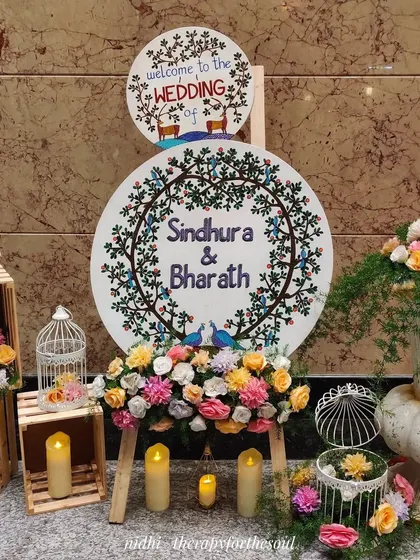The finished Gond art wedding signage displayed beautifully at the venue. It makes me so happy to see my art become a part of such a special day.