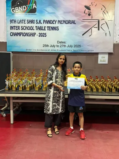 Aryaveer Borah receiving his Gold Medal for the U-11 Boys category at the GBN Interschool Championship. His powerful performance set him apart from the competition.