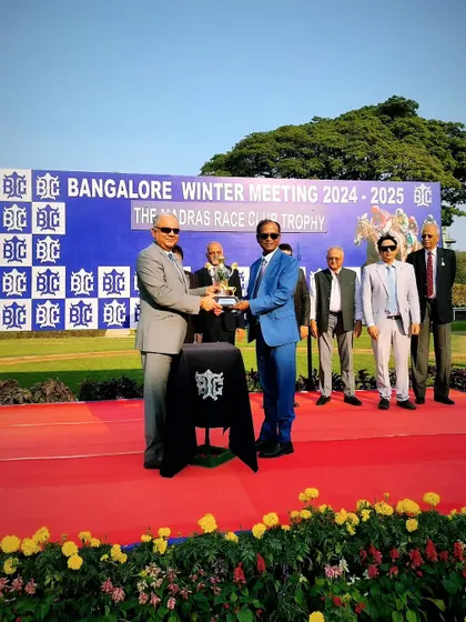 Mr. Chaduranga Kanthraj Urs presents The Madras Race Club Trophy to the owner of Star Glory.