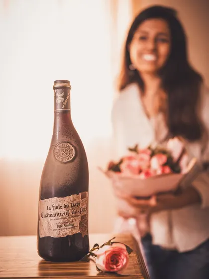 A self-portrait with the vintage wine bottle, adding a personal and relatable touch to the Valentine's Day series.