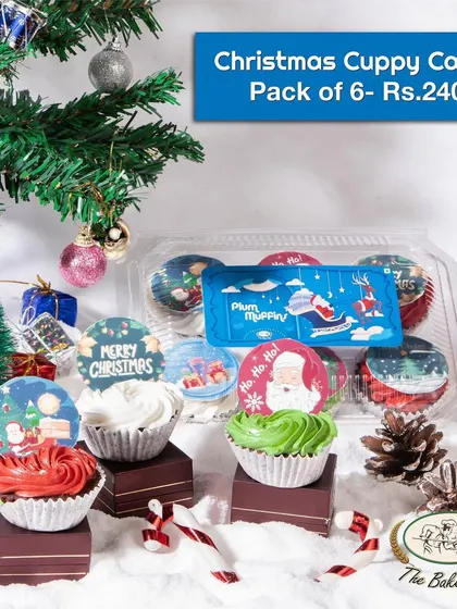 A pack of six Christmas Cuppy Cakes, featuring a variety of colorful frostings and holiday-themed toppers. These are perfect for parties and sharing with friends.