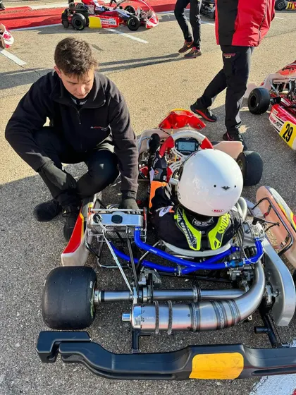 A driver and coach in the pit lane in Zuera, Spain.