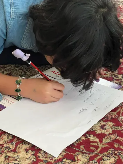 The beginning of a new project. We encourage kids to practice and explore different techniques before starting on their final piece.