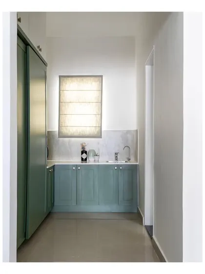 A small pantry and coffee corner was integrated into the home office, providing convenience and a place for short breaks.