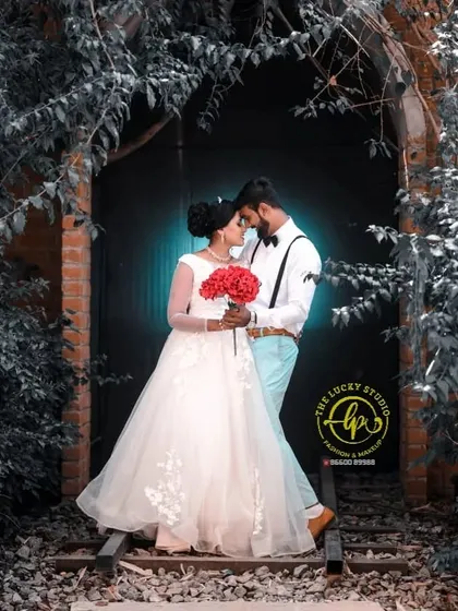 A romantic pre-wedding photo with a vintage feel. I styled the bride in a beautiful white gown with long sleeves and provided a smart-casual look for the groom with a bow tie and suspenders.