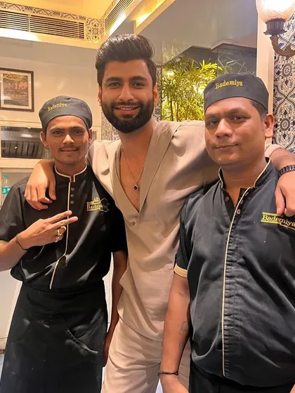 Comedian Harsh Gujral sharing a moment with our staff at the Bandra restaurant.