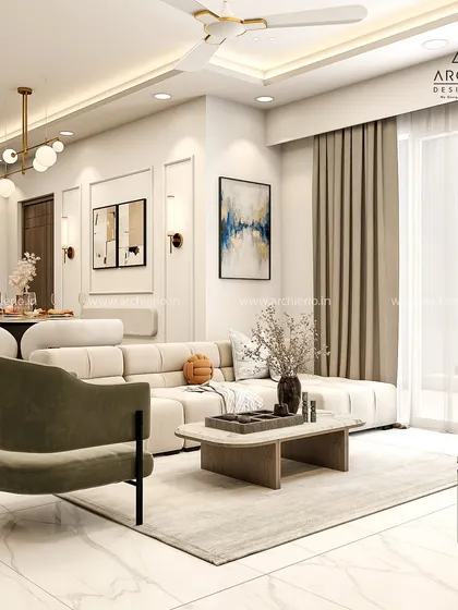 A wide view of a contemporary living room, showing the harmonious blend of neutral tones, comfortable seating, and modern art. The space is designed to feel open and inviting.
