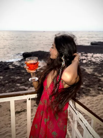 Another angle of me enjoying the view from the balcony. The places we stay are always chosen for their beautiful settings and comfortable amenities.