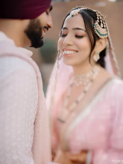 A close-up portrait of the bride, her happy and serene expression beautifully captured.