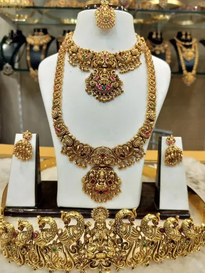 A slightly different angle of the stunning Lakshmi and peacock motif bridal set, showcasing its intricate details.