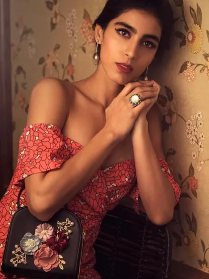 A series from a vintage-themed shoot. I mixed different textures and patterns, like a denim crop top with checkered pants and a floral dress, to create a retro-inspired story with a modern twist.