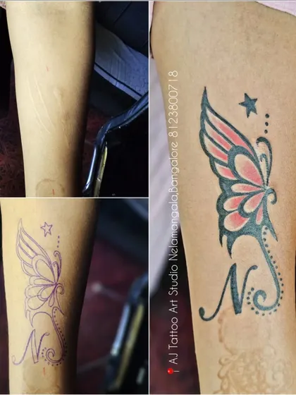 This client had a scar and some old ink. I designed a butterfly and initial tattoo to cover the area beautifully.
