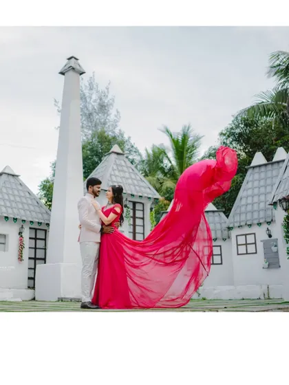 A fairytale castle for a fairytale romance. The bride's flowing pink trail gown adds the perfect touch of magic to this dreamy pre-wedding photoshoot.