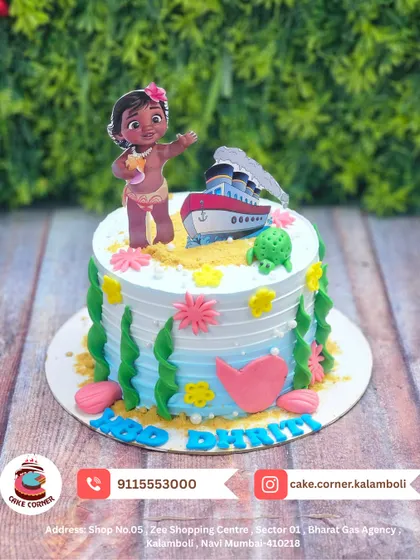 A sweet Moana-themed cake for Dhriti. The design features baby Moana, a boat, and ocean elements, perfect for a tropical birthday adventure.