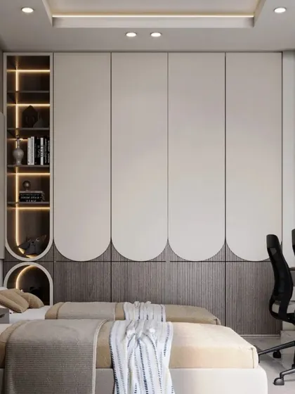 A shared bedroom for two children with a clean, modern aesthetic. The design features matching twin beds, a dual-station study desk, and stylish scalloped wardrobe doors with integrated shelving.