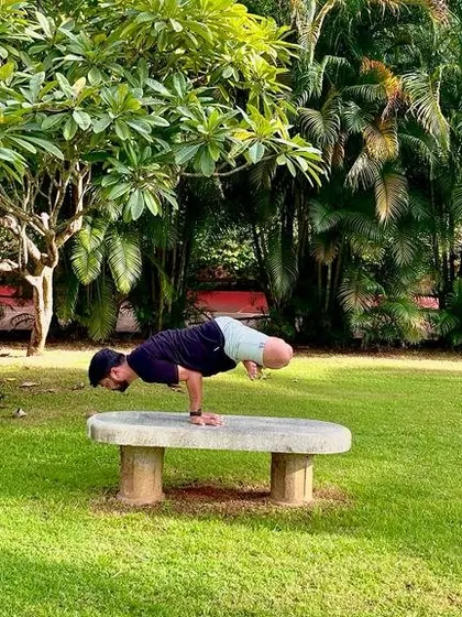 Yoga is a science of well-being. These images capture the beauty of practicing in nature, from the beach at sunrise to a lush green park, reminding us to connect with the world around us.