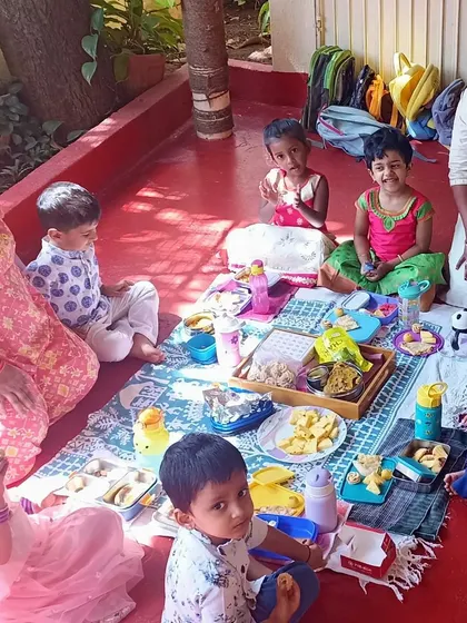 More children enjoying the special Ugadi snacks and the company of their friends.