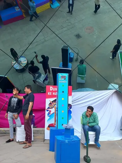 This overhead view shows how I can set up a complete gaming zone with multiple stalls. Here you can see the hammer game, 360 booth, and other activities ready for guests.