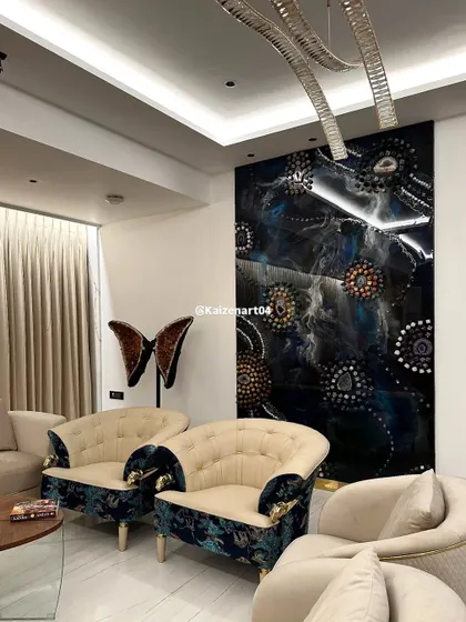The full astrology-themed conceptual wall art installed in a client's luxurious living room. It serves as a magnificent and thought-provoking centerpiece.