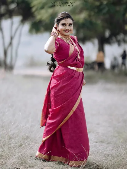 A candid and graceful portrait of the bride during her engagement photoshoot, capturing a moment of natural movement.