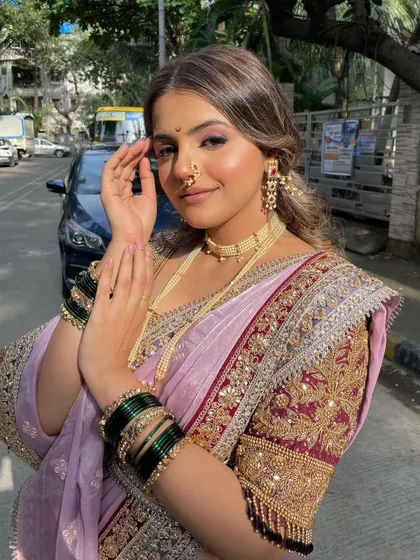 A candid, happy moment. The goal is always to create a look that feels as good as it looks, allowing the bride's personality to shine.