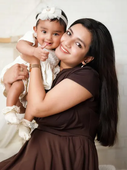 Where the lens meets love. This tender moment between a mother and her baby is what family photography is all about, creating heirlooms from moments.