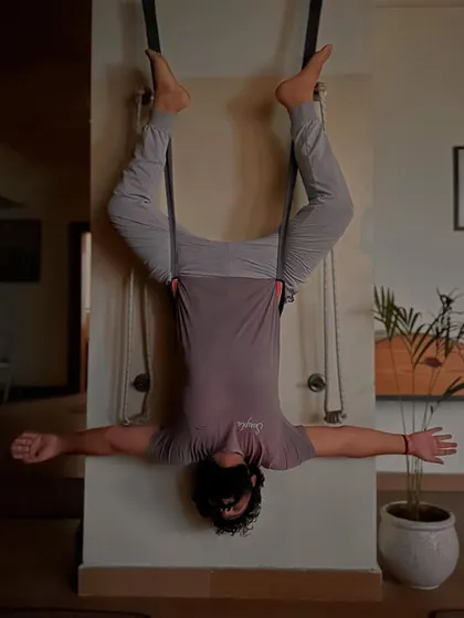 An inverted aerial pose that helps to lengthen the spine and improve blood circulation to the brain. For me, this is a form of devotion.