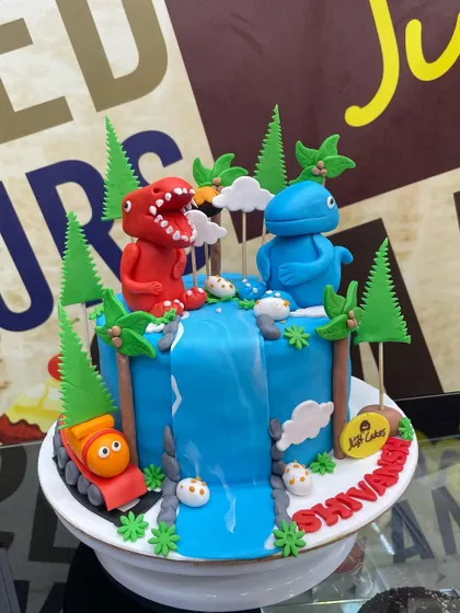 A prehistoric adventure awaits with this 4kg dinosaur cake, featuring a waterfall and fondant T-Rex.