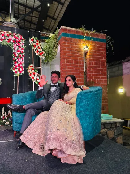 The happy couple relaxing on their Sangeet stage. We create comfortable and stylish seating areas for the bride and groom.