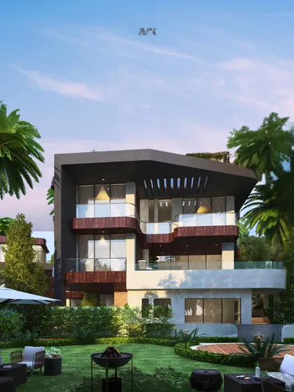 An exterior view of a villa at the Evara township. The design uses a dynamic composition of intersecting volumes, balconies, and terraces to create a modern home that offers both privacy and a strong connection to its private garden.