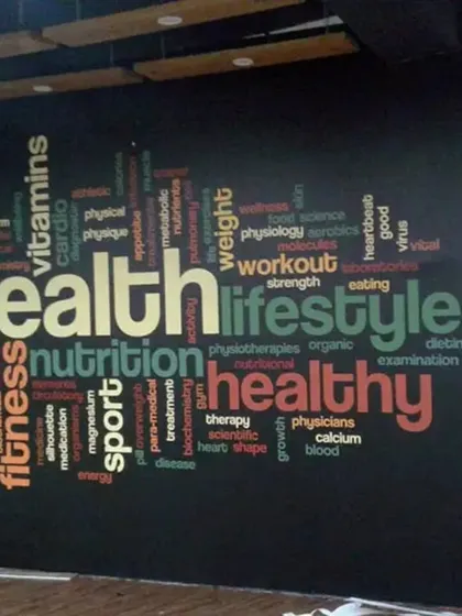This word cloud mural, centered around "health" and "lifestyle," is perfect for a wellness center or gym. It visually reinforces the core values of the business and creates a positive, health-focused environment.