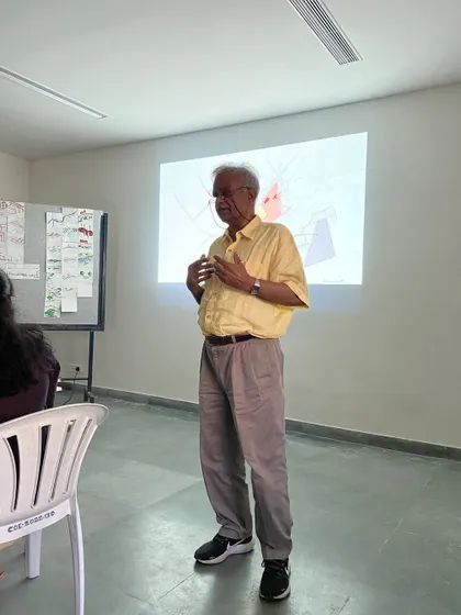 Leading a design charrette at CARE School of Architecture. These intensive workshops challenge students to think quickly and collaboratively, generating creative solutions for complex urban problems.