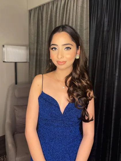 Gorgeous Khyati in electric blue. For this cocktail party look, I kept the skin fresh and dewy, with a subtle winged liner and a nude lip to let the dress be the hero.