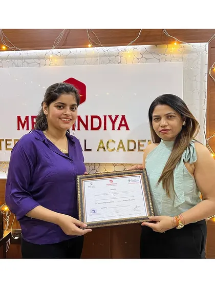 The smile of success. This student has completed her professional training and is ready for the next chapter.