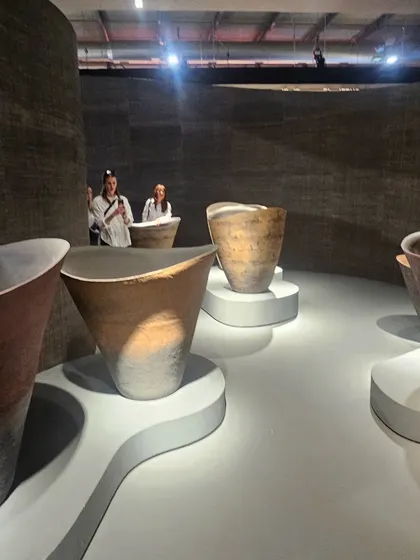 An artistic display of large, rustic planters in our showroom. Their organic shapes and earthy tones make them a perfect fit for contemporary and minimalist designs.