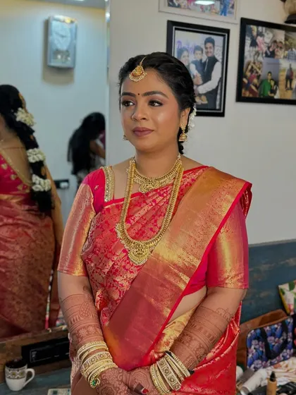 The complete look, with the beautiful saree drape and perfectly styled hair, ready for her wedding ceremony.