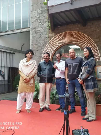 A group photo with the faculty and organizers of the Impressions festival at COEP.